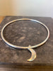 Belle & Bee 2mm hammered sterling silver bangle with a mini moon charm