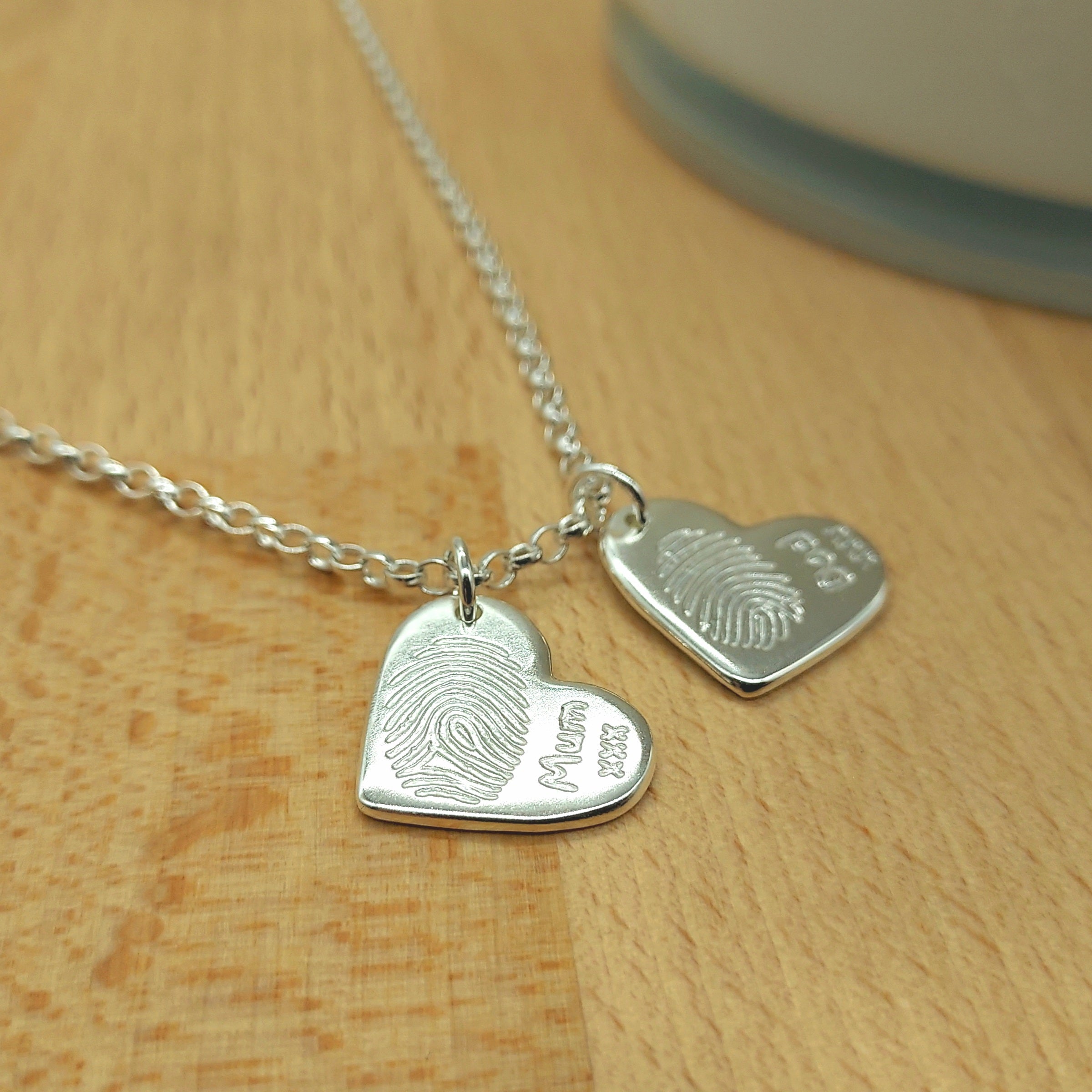 Sterling Silver Belcher necklace with 2 x heart shaped fingerprint charms.