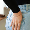 Sterling Silver Hammered Bangle with Gold Love Loop