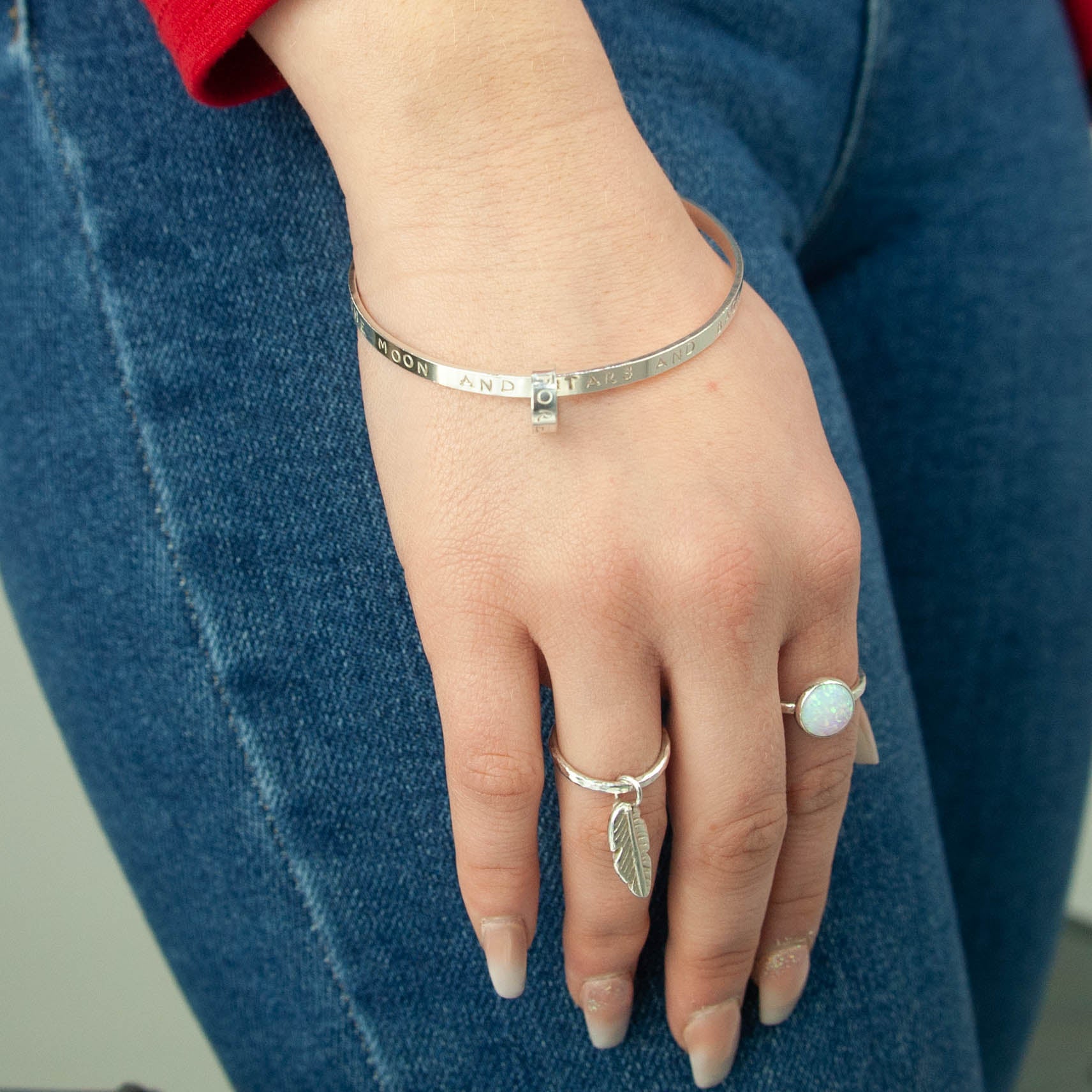 Belle & Bee Sterling Silver 2mm Hammered Stacking Ring with Mini Chunky Feather Charm